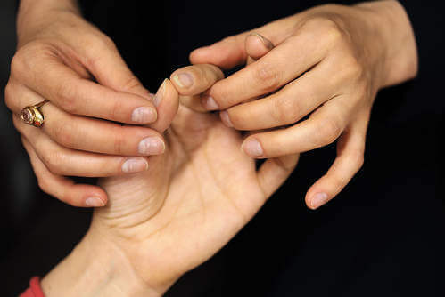 kinesiology test with fingers
